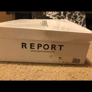 Report Everton black boots